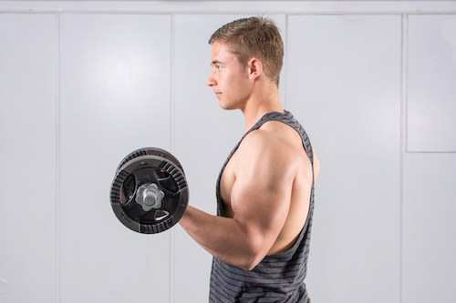 man performing biceps workout